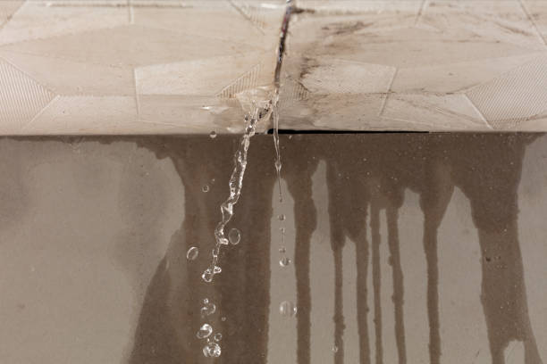 Professional Flood Damage Cleanup technician working in Sheakleyville, PA